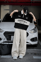 LEGACY VARSITY POLO TEE - BLACK - UNISEX