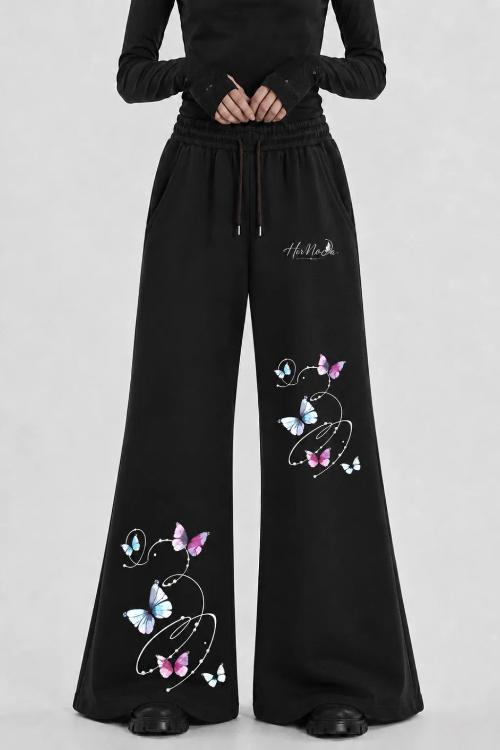 DREAM GLOW FLARE HEM TROUSER | BLACK | HERMODA